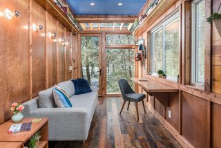A large picture window sits above Funke's writing desk. The desk was brand new, and Latimer had to put it through a few processes to achieve a certain patina.<br> <span style="color: rgb(204, 204, 204); font-size: 13px;">StudioBuell</span>
