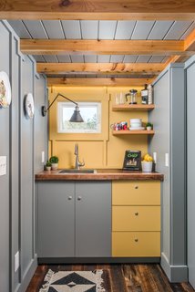 A full-on kitchen was not necessary, but the suitably tiny facilities provide just what is needed to prepare a cup of coffee. 