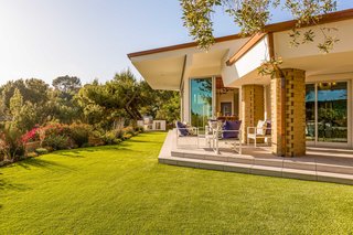 Set on nearly 1.5 acres in lower Bel Air, the home features breathtaking views of the Pacific Ocean and the Getty Museum. 