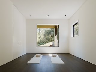 A tranquil nook allows the homeowner to practice yoga.