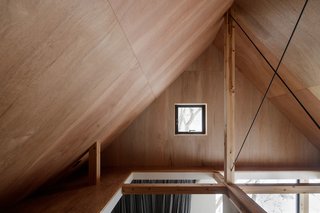 The open attic creates an airy sense of space for the lower levels, and offers more room for storage. 