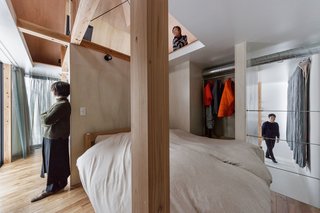 The upper level conceals the bedroom. 