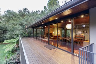 The home features a generous wraparound terrace with direct access to the great room. 