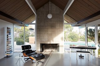 Another original Eichler element which the homeowners have chosen to keep is the concrete masonry fireplace.