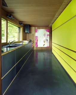The interior design is very much part of the home’s identity, with some of the furniture built into the property and designed by the artist-homeowner himself to reflect and complement the surrounding landscape. 