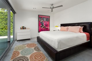 The master suite opens directly onto the pool area. 