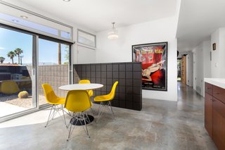 The entry opens into the updated kitchen and dining area. 