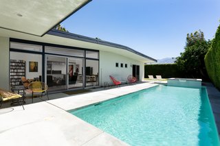 The home opens up to an expansive patio with a saltwater Pebble Tec pool and spa—not to mention striking mountain views.