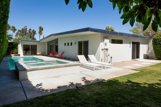 The private backyard has ample space for poolside entertaining. 