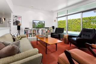 The living room opens to the pool and patio area.