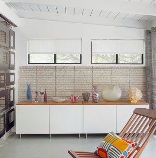 A groovy metal divider on the left delineates the space. 