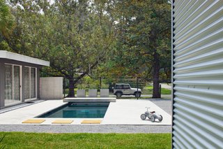 The deck of the "Think Tank" overlooks the backyard pool.