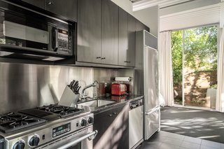 The open kitchen is small, yet highly efficient.