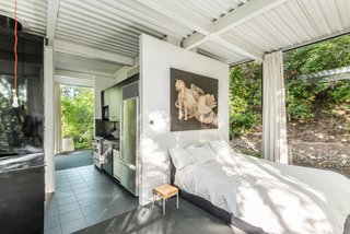 The "bedroom" is directly off the kitchen. 