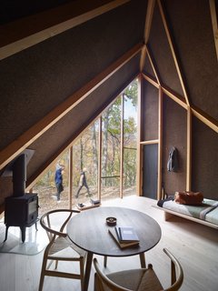 Handcrafted furniture from Carl Hansen and a bed fitted with Kvadrat fabric and designed by Soren Rose Studio are some of the minimalist Nordic touches. 