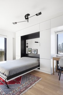 The hideaway bed tucks neatly into the storage unit. 