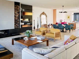 A peek at the open-plan living, dining, and kitchen areas.