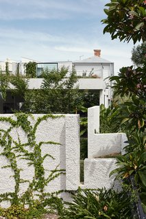 Beginning at the front, the garden walls meander under the existing cottage and finish at the rear of the site. 