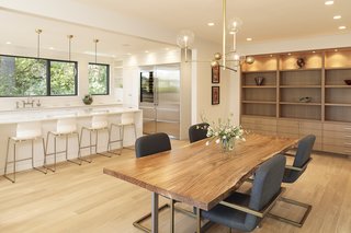 At the other end, he added floor-to-ceiling, built-in shelving, which has created a more streamlined look and eliminated the need for additional furniture.
