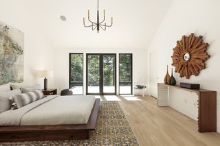 Silver vaulted the ceilings, while also incorporating french doors to the patio. 