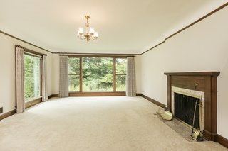 The living room was closed off from the rest of the spaces and had a flat ceiling. 