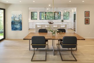 Silver opened the kitchen to the dining room, creating the sense of one big space with a seamless flow. He also inserted french doors to an exterior patio. 