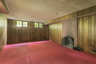 Before, this space was dark and featured wood-paneled walls. 