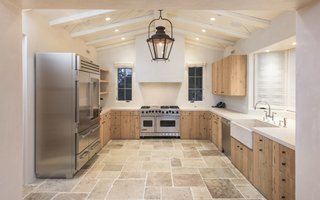 The kitchen houses state-of-the-art appliances. 