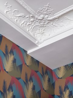 A detail of the ceiling's original molding. 