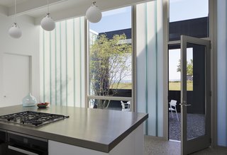 Directly east of the kitchen is a dining courtyard, which receives beautiful morning sunlight. This area is also shaded from the western sun in the late afternoon.