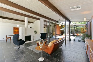 The expansive open-plan living area is also bright and airy. 