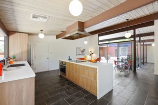 There is new porcelain tile flooring throughout.