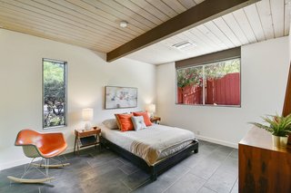 All of the bedrooms have a spacious, yet midcentury feel. 
