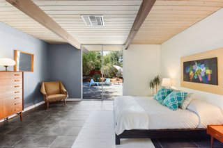 The master bedroom also features sliding doors out to the patio. 