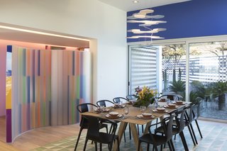 Moneo Brock also designed the geometric carpets and the "PlexiJazz" translucent acrylic and colored vinyl screen, which initially set the tone for the interior design. 
