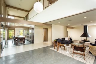 The main entry level features an open floor plan and polished concrete floors. 