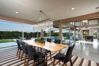 A formal dining room is also configured into the open plan. 