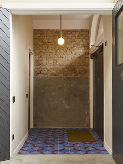 Splashes of color are interwoven into the original fabric of the structure, which reflects the creativity of the client. 