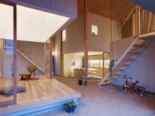 The space also allows for traditionally "outdoor" items, like a child's bicycle, to be stored or even used inside. 