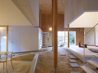 "By taking in the slope into the building and creating a sloped 'doma' area, it was possible to bring the outside into the building," say the architects. 