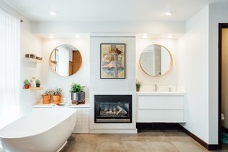 The master bath has a fireplace to keep things cozy. 