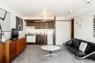 The downstairs features a mini-kitchen.