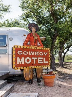 Ample space for guests includes a refurbished 1976 "Texas Motel" Airstream—and the family has plans for additional guest quarters in the works. 