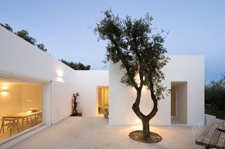 The patio space helps connect the home to nature, allowing guests to enjoy a taste of Mediterranean indoor/outdoor living. 