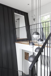 The intention of the design was to tie both spaces together into one very modern house that retains a link to its past.