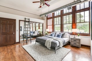 Large windows allow ample light to flood into the bedrooms. 