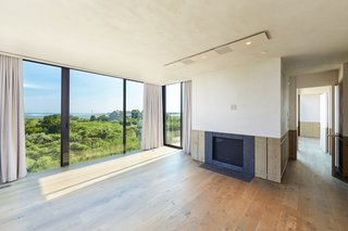 The minimalist interiors feature European white oak flooring and other high-end, custom finishes.