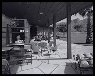 Architect Paul R. Williams designed the Thunderbird Country Club home with exposed beam ceilings overlooking the 17th fairway. The house was built on a slight curve with two angled wings, one with a floating roof that shaded the carport.