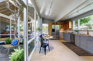The former owner was a master craftsman who custom-created all the cabinetry in the kitchen, bedroom, and closets.