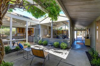 Flooded with natural light, this property offers a true indoor-outdoor living experience. 
